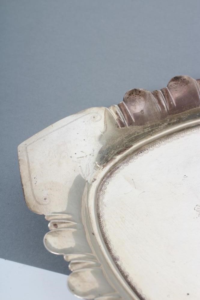 A LATE VICTORIAN SILVER DRESSING TABLE TRAY Image