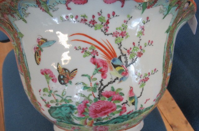 A CANTONESE PORCELAIN JARDINIERE of circular form with everted rim and drainer hole to base Image