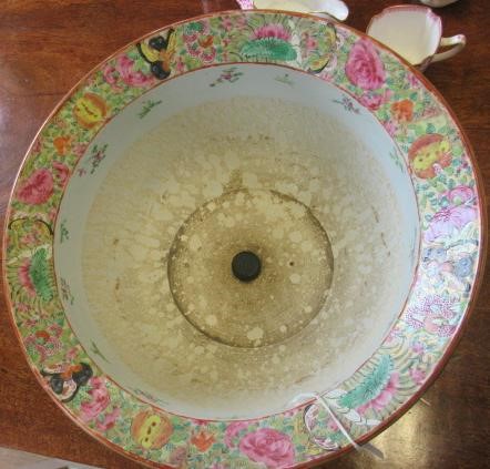 A CANTONESE PORCELAIN JARDINIERE of circular form with everted rim and drainer hole to base Image