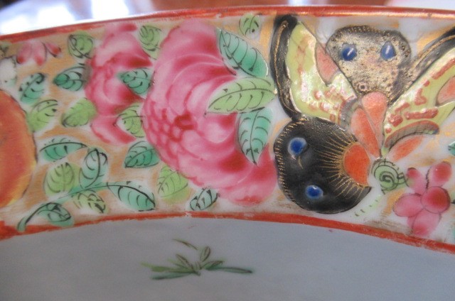 A CANTONESE PORCELAIN JARDINIERE of circular form with everted rim and drainer hole to base Image