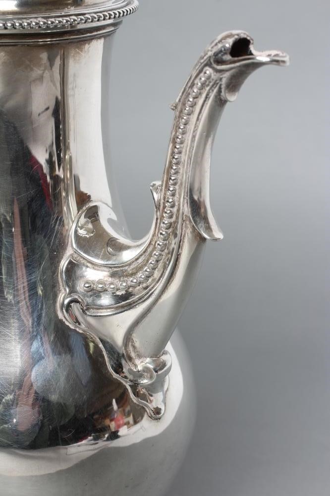 A GEORGE III SILVER COFFEE POT Image