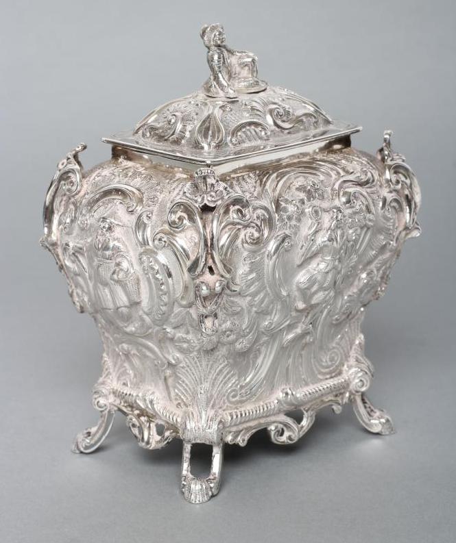 AN EARLY VICTORIAN SILVER CHINOISERIE TEA CADDY AND COVER Image