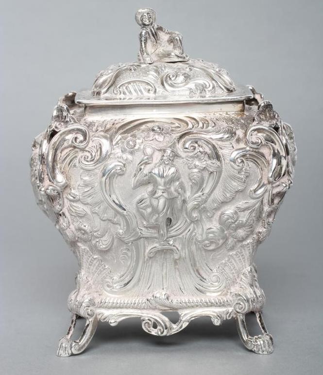 AN EARLY VICTORIAN SILVER CHINOISERIE TEA CADDY AND COVER Image