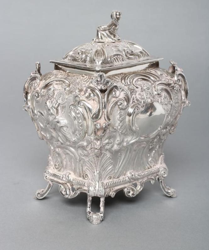 AN EARLY VICTORIAN SILVER CHINOISERIE TEA CADDY AND COVER Image