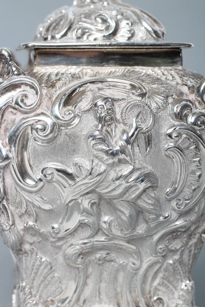 AN EARLY VICTORIAN SILVER CHINOISERIE TEA CADDY AND COVER Image
