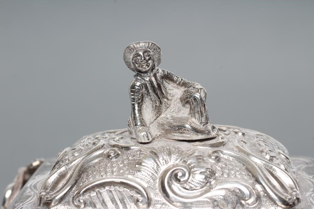 AN EARLY VICTORIAN SILVER CHINOISERIE TEA CADDY AND COVER Image