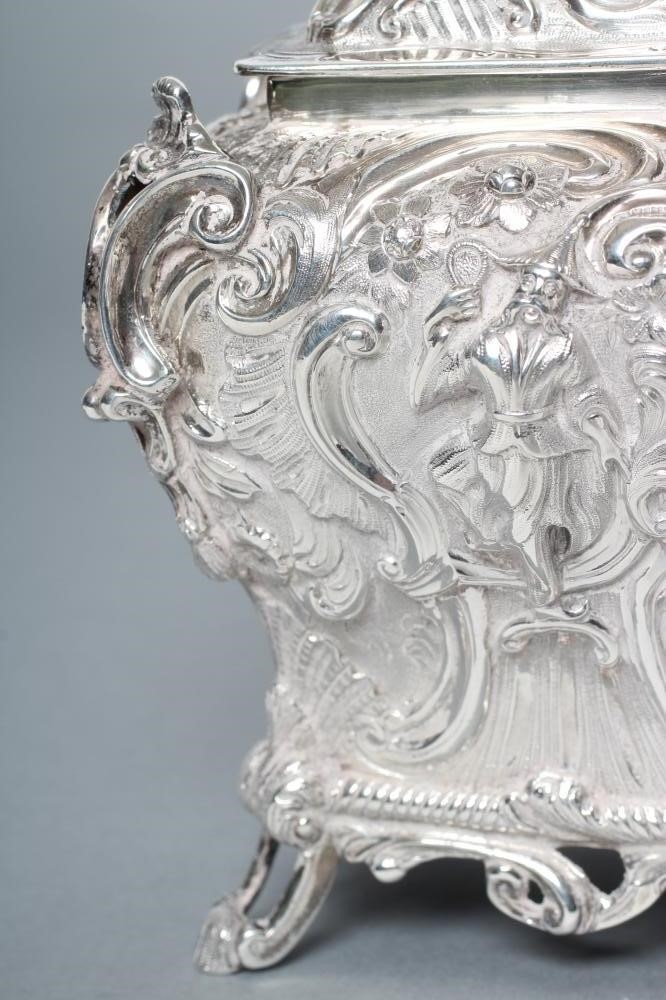 AN EARLY VICTORIAN SILVER CHINOISERIE TEA CADDY AND COVER Image