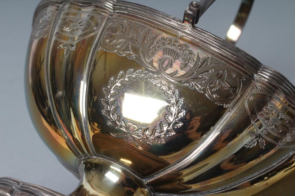 A GEORGE III SILVER SUGAR BASKET Image