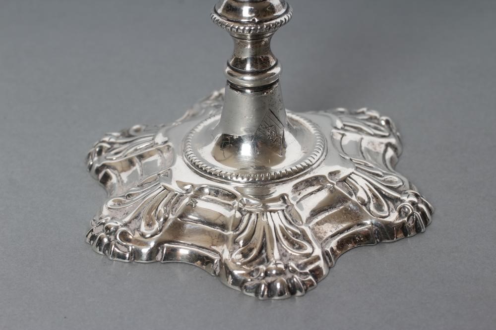 A GEORGE III SILVER TAPER STICK Image