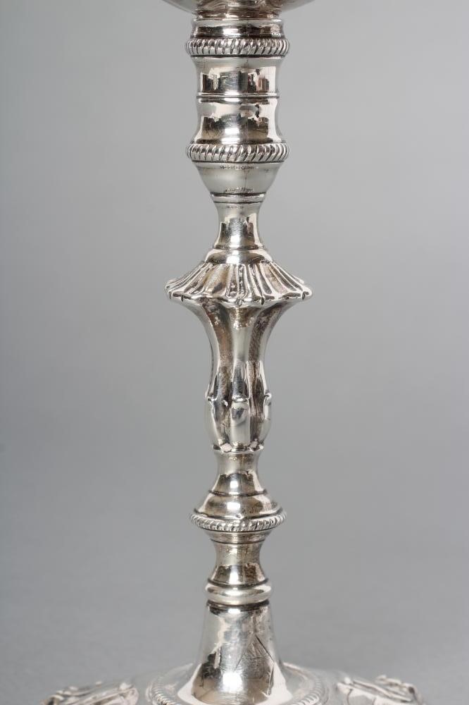 A GEORGE III SILVER TAPER STICK Image