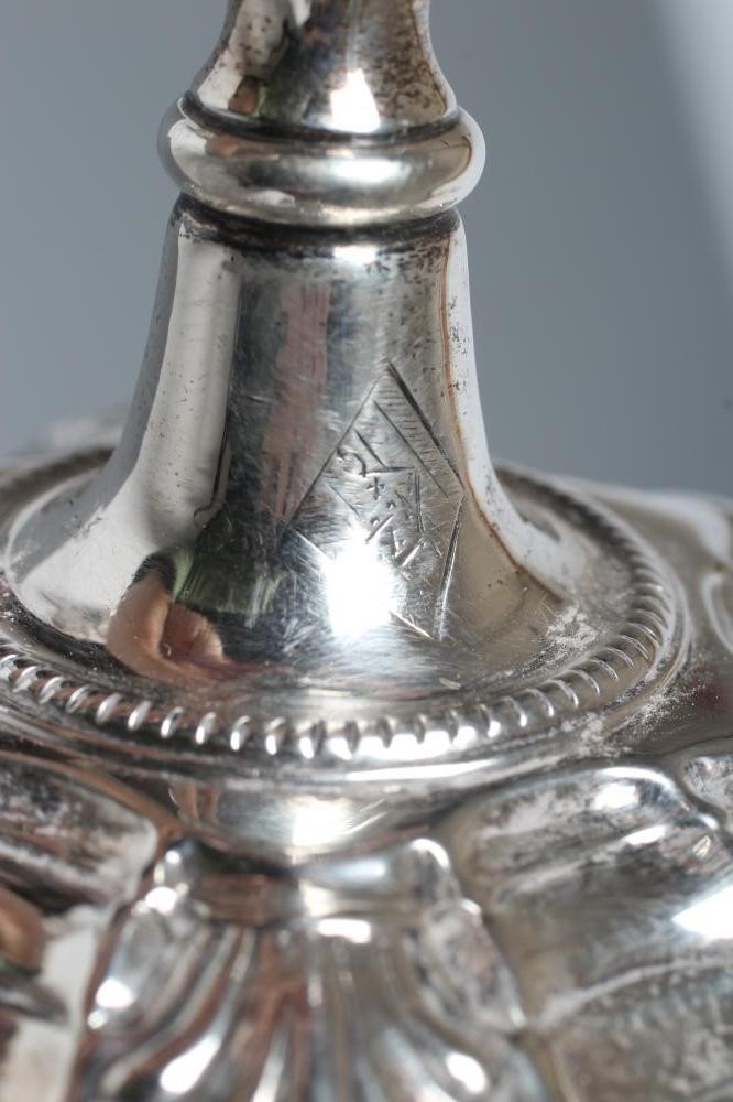 A GEORGE III SILVER TAPER STICK Image
