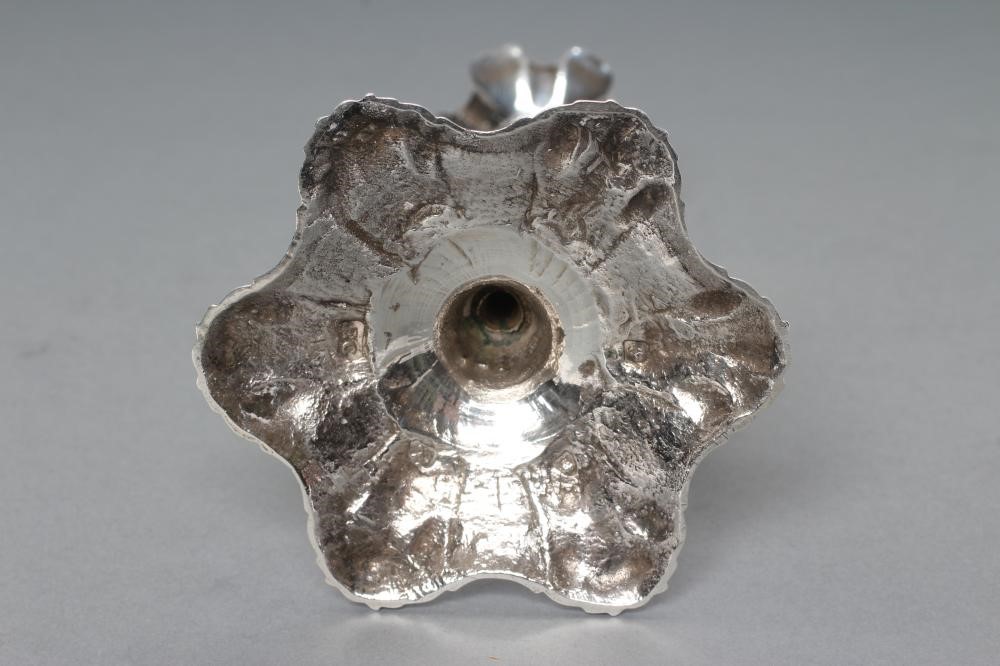 A GEORGE III SILVER TAPER STICK Image