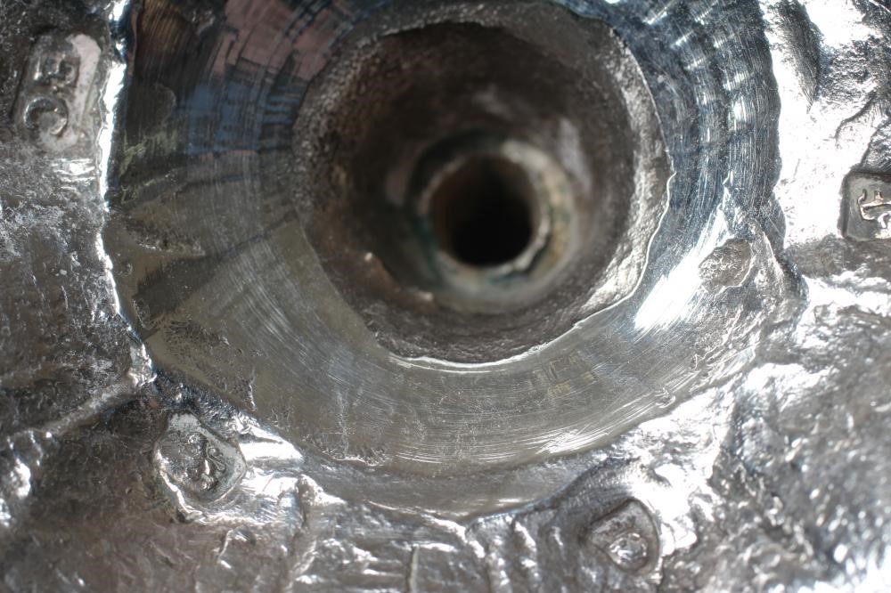 A GEORGE III SILVER TAPER STICK Image