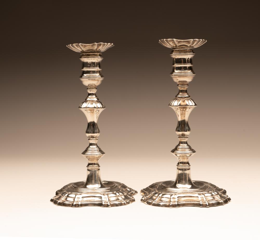 A PAIR OF GEORGE II SILVER CANDLESTICKS Image