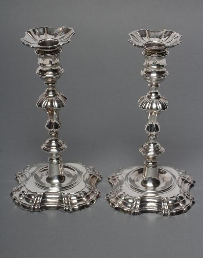 A PAIR OF GEORGE II SILVER CANDLESTICKS Image