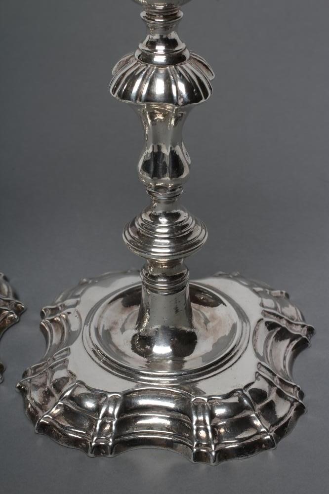 A PAIR OF GEORGE II SILVER CANDLESTICKS Image