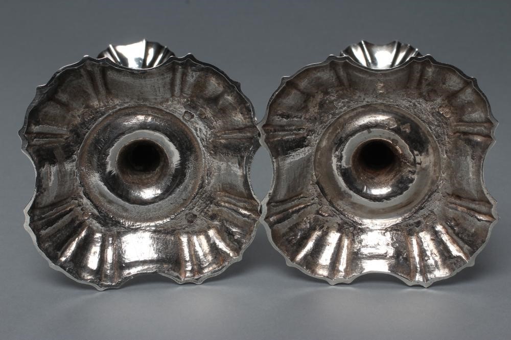 A PAIR OF GEORGE II SILVER CANDLESTICKS Image