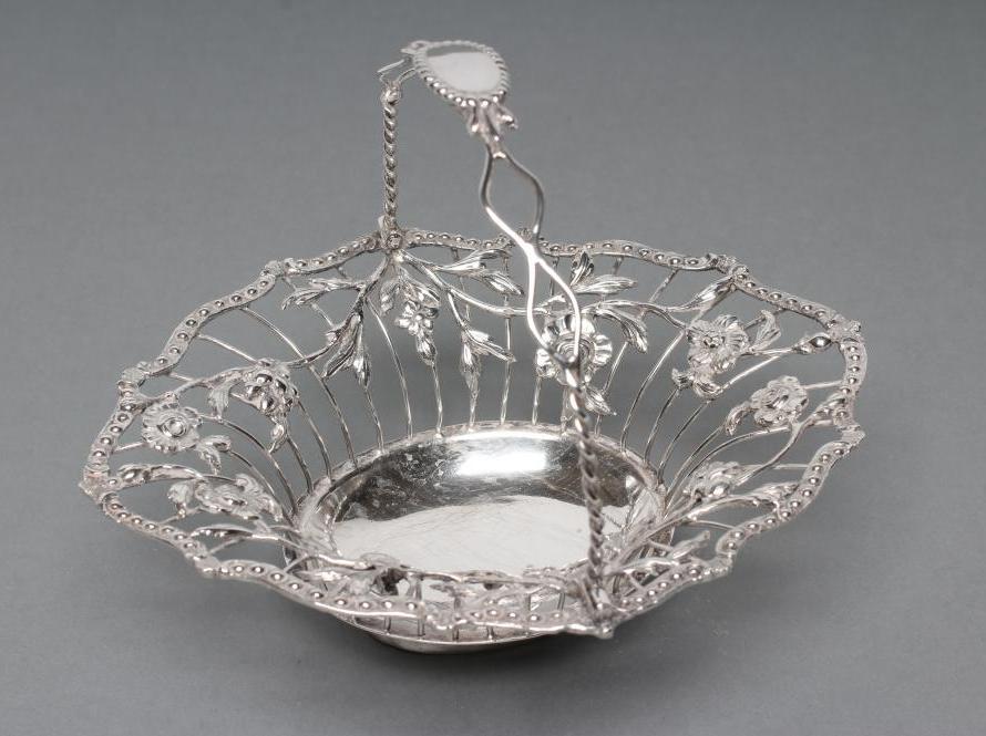 A GEORGE III SILVER WIREWORK SWEETMEAT BASKET Image