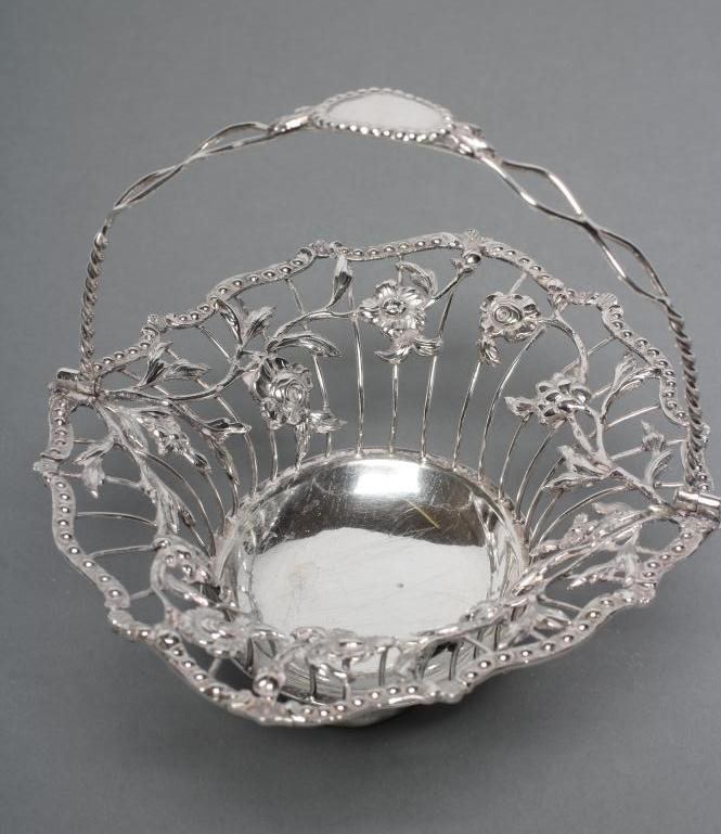 A GEORGE III SILVER WIREWORK SWEETMEAT BASKET Image