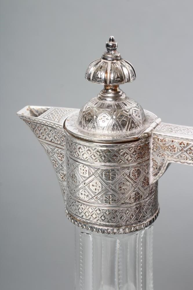 A LATE VICTORIAN SILVER MOUNTED SHAFT AND GLOBE GLASS CLARET JUG Image