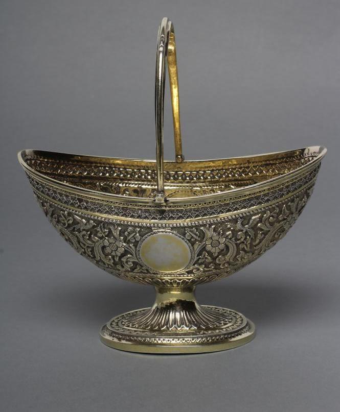 A VICTORIAN SILVER GILT SUGAR BASKET Image