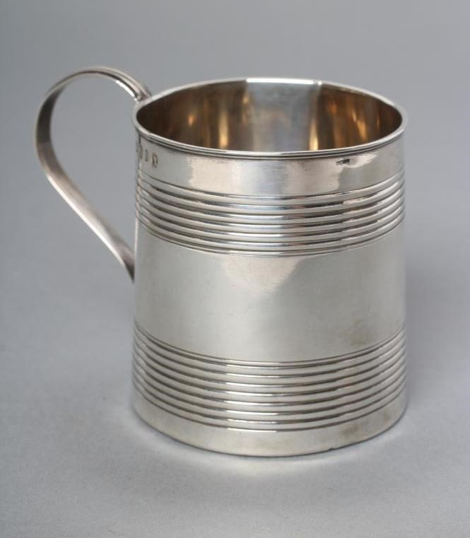 A LATE GEORGE III SILVER CHRISTENING MUG Image