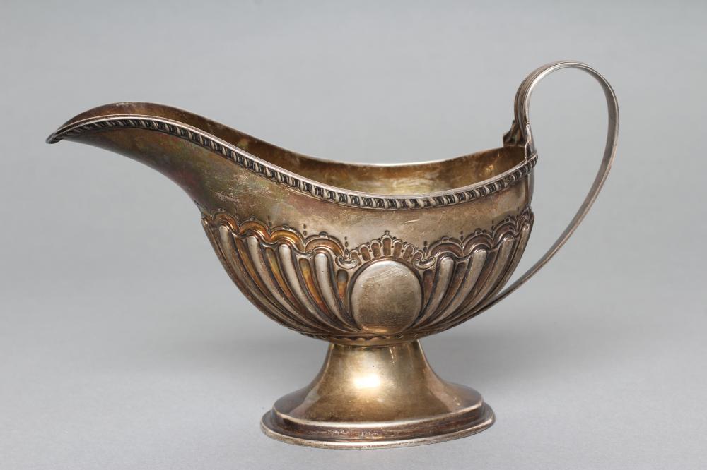 A LATE VICTORIAN SILVER SAUCE BOAT Image
