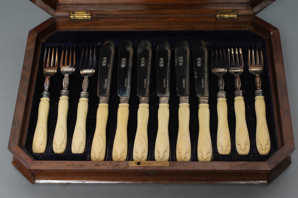 A VICTORIAN SILVER SET OF SIX PAIRS OF FISH KNIVES AND FORKS Image