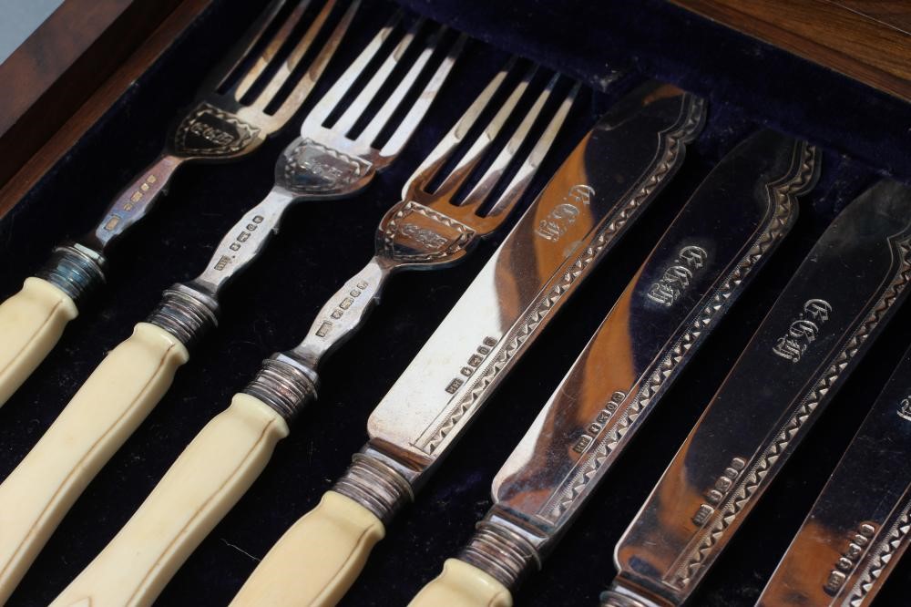 A VICTORIAN SILVER SET OF SIX PAIRS OF FISH KNIVES AND FORKS Image