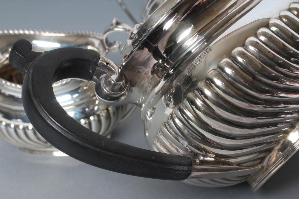 A BACHELOR'S LATE VICTORIAN SILVER THREE PIECE TEA SERVICE Image