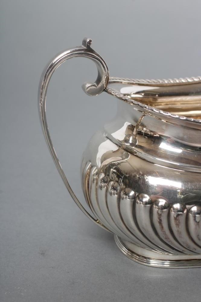 A BACHELOR'S LATE VICTORIAN SILVER THREE PIECE TEA SERVICE Image
