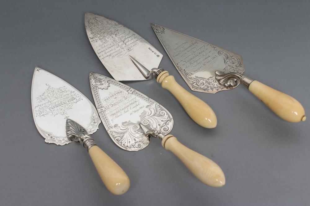 A COLLECTION OF FOUR VICTORIAN SILVER PRESENTATION TROWELS Image