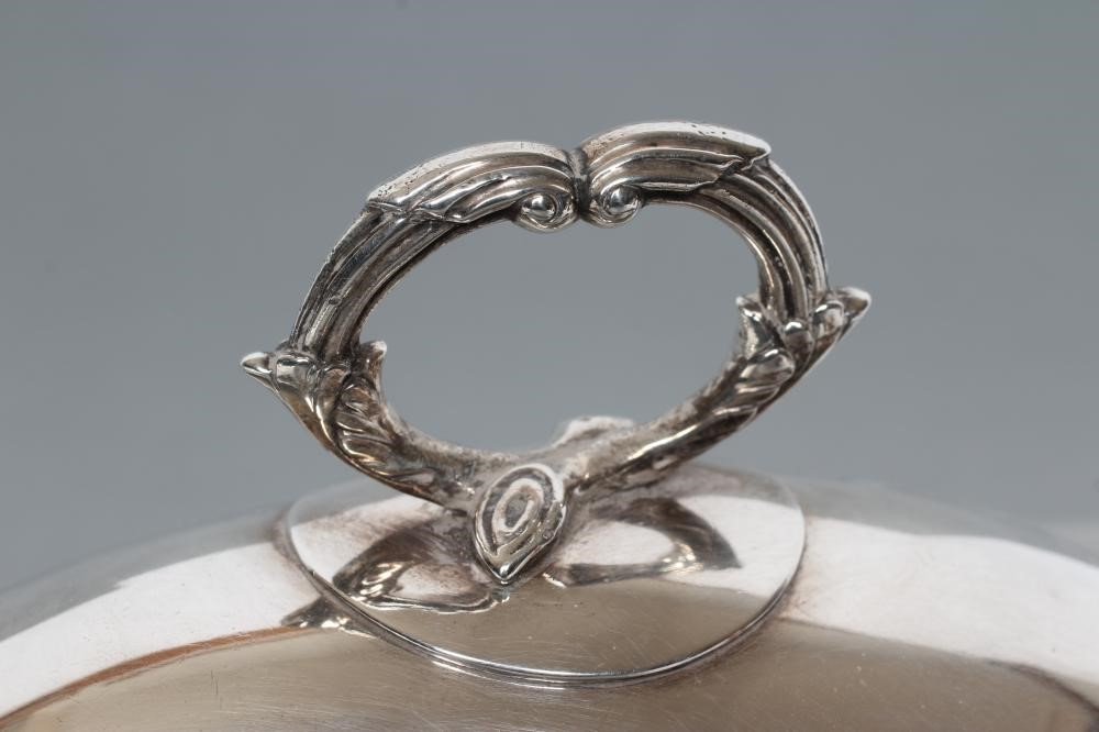 A PAIR OF LATE GEORGE III SILVER TUREENS AND COVERS Image