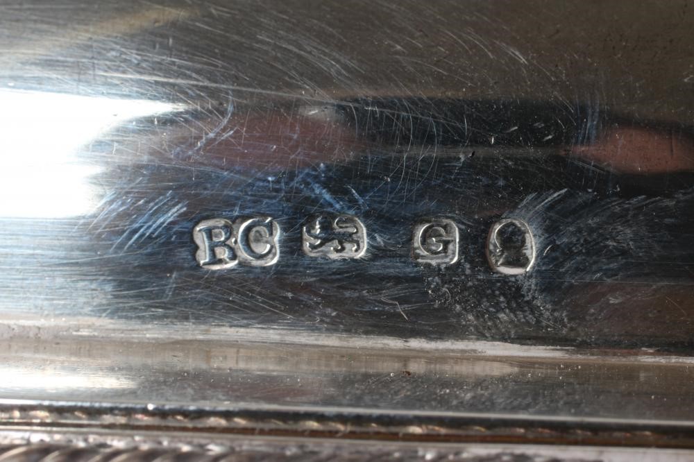 A PAIR OF LATE GEORGE III SILVER TUREENS AND COVERS Image