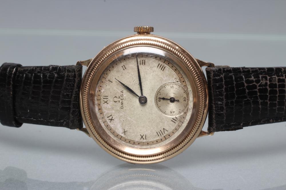 A GENTLEMAN'S 9CT GOLD OMEGA WRISTWATCH Image