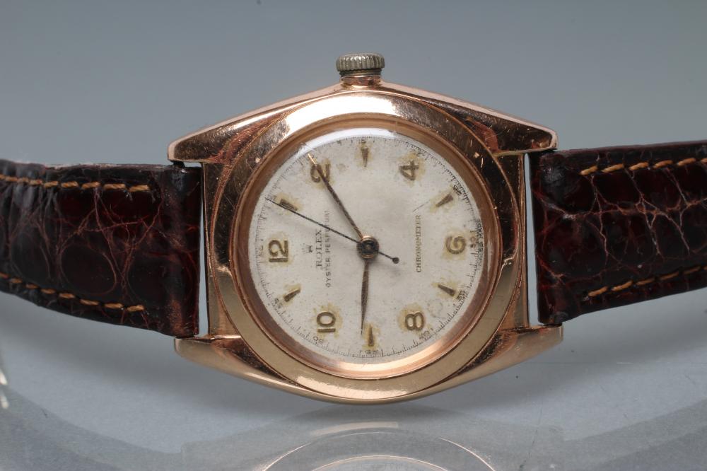 A GENTLEMAN'S GOLD BUBBLE BACK ROLEX OYSTER PERPETUAL CHRONOMETER Image