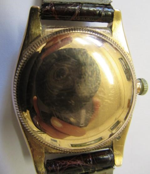 A GENTLEMAN'S GOLD BUBBLE BACK ROLEX OYSTER PERPETUAL CHRONOMETER Image