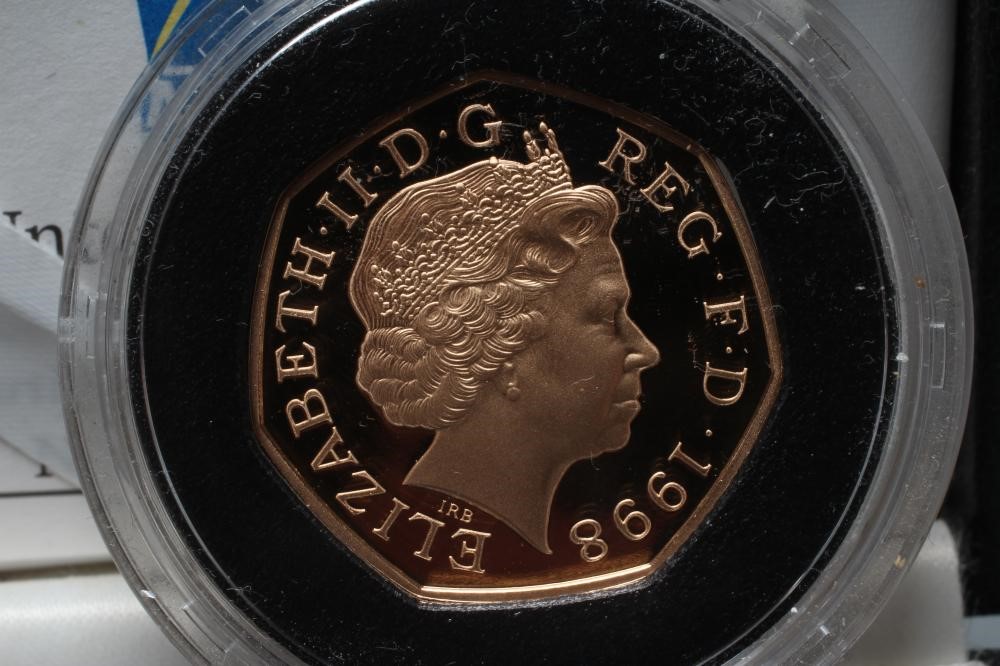 AN ELIZABETH II GOLD PROOF 50p celebrating fifty years of the NHS Image