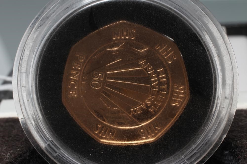 AN ELIZABETH II GOLD PROOF 50p celebrating fifty years of the NHS Image