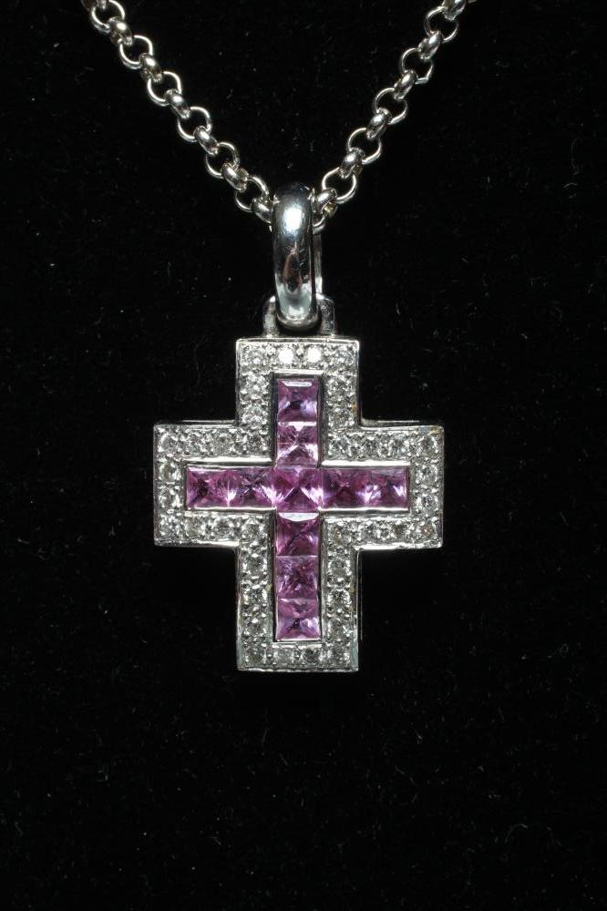 A CROSS PENDANT to match the previous two lots Image