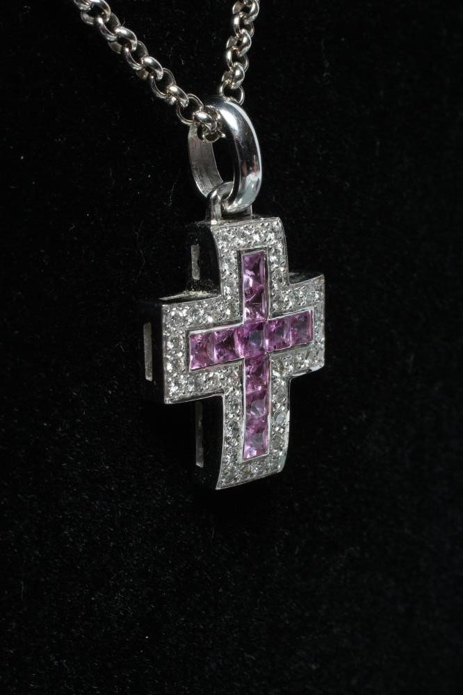 A CROSS PENDANT to match the previous two lots Image