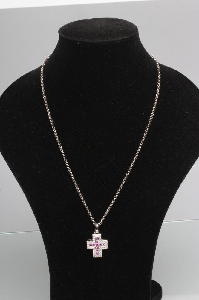 A CROSS PENDANT to match the previous two lots Image