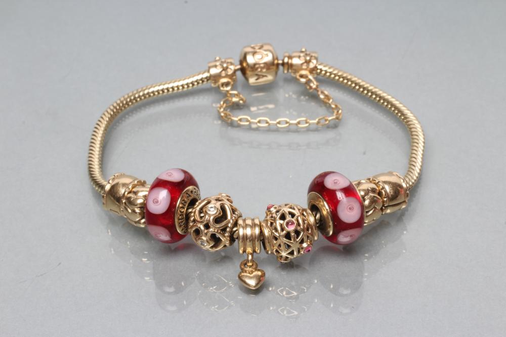 A PANDORA CHARM BRACELET Image