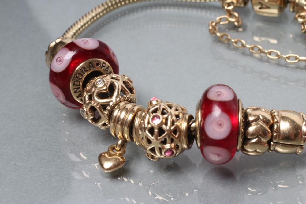 A PANDORA CHARM BRACELET Image