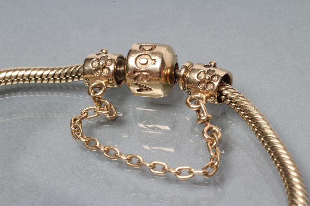 A PANDORA CHARM BRACELET Image