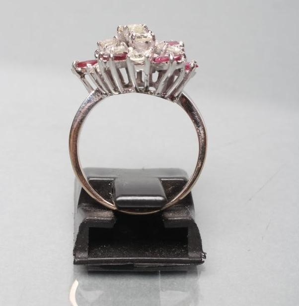 A RUBY AND DIAMOND CLUSTER RING Image