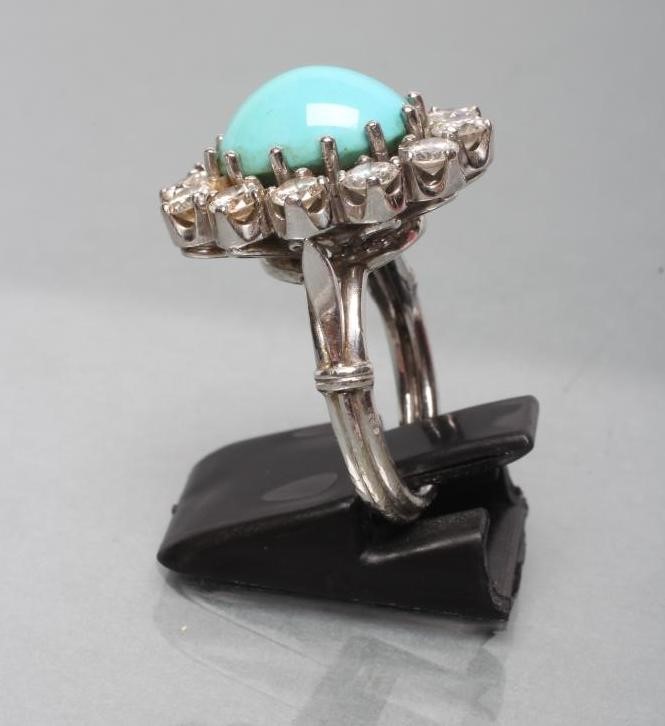 A TURQUOISE AND DIAMOND CLUSTER RING Image