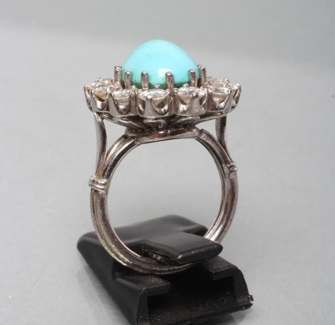A TURQUOISE AND DIAMOND CLUSTER RING Image