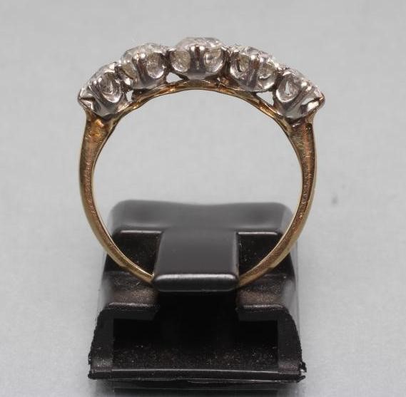 A FIVE STONE DIAMOND RING Image