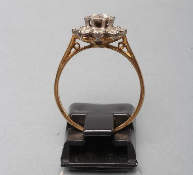 A DIAMOND CLUSTER RING Image